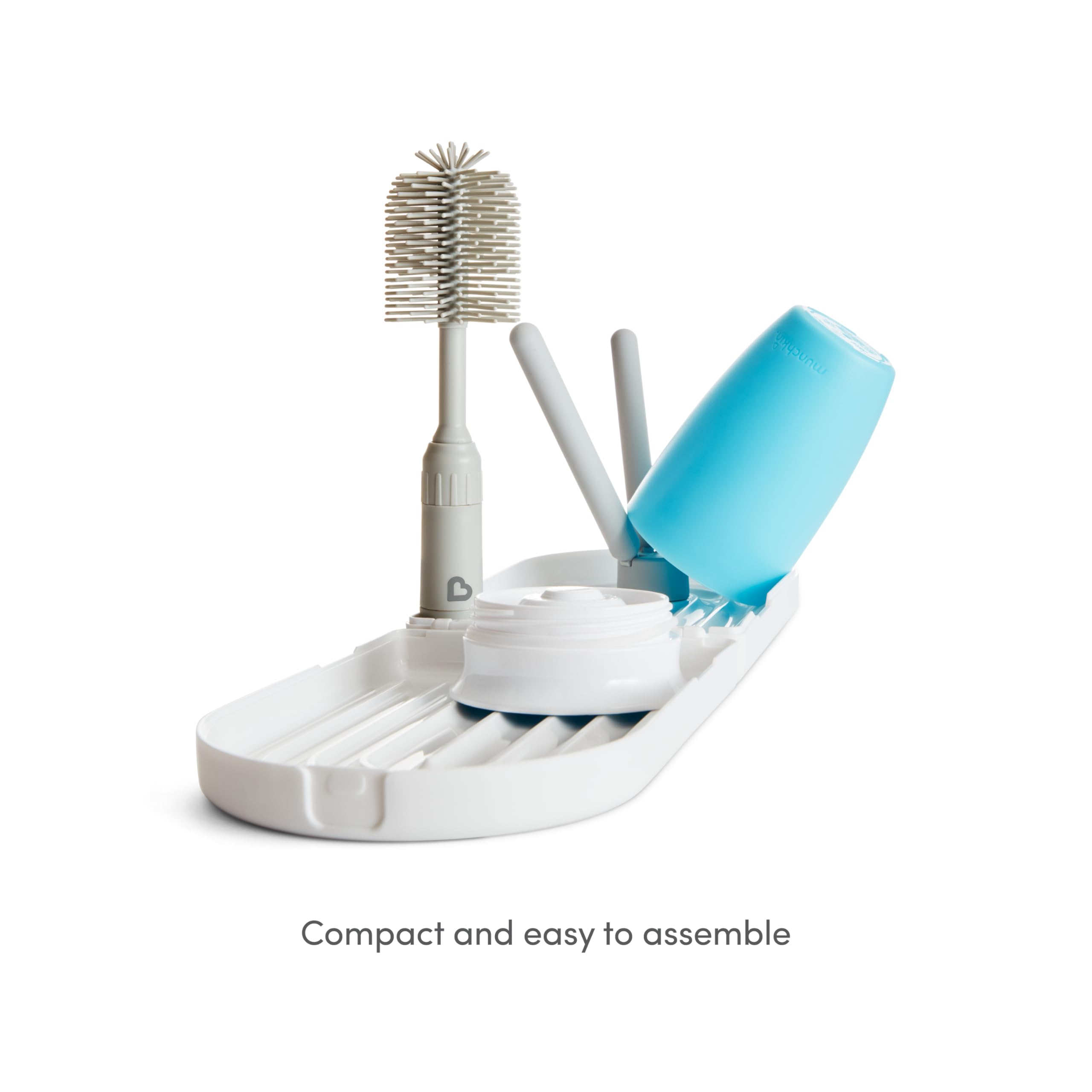 munchkin-gouttoir-de-voyage-pliable-brosse-silicone-extensible-3-biberons image 4